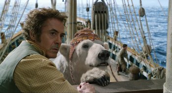 Movie still from “Dolittle” (2020), directed by Stephen Gaghan – A man and a polar bear on a boat; Close Up shot, Over the shoulder angle