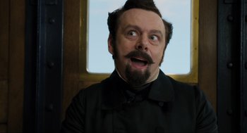 Movie still from “Dolittle” (2020), directed by Stephen Gaghan – A person with a beard and mustache; Close Up shot, Low angle