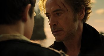 Movie still from “Dolittle” (2020), directed by Stephen Gaghan – A person and a man face to face; Close Up shot, Over the shoulder angle