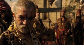 Movie still from “Dolittle” (2020), directed by Stephen Gaghan – A person with a beard and a mustache; Close Up shot, Over the shoulder angle