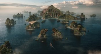 Movie still from “Dolittle” (2020), directed by Stephen Gaghan – An aerial view of a group of islands in the middle of the ocean; Extreme Wide shot, High angle