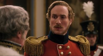 Movie still from “Dolittle” (2020), directed by Stephen Gaghan – A person wearing a uniform; Close Up shot, Over the shoulder angle