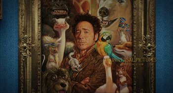 Movie still from “Dolittle” (2020), directed by Stephen Gaghan – A painting of a man surrounded by many different animals; Medium shot, Overhead angle