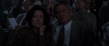 Movie still from “Donnie Darko” (2001), directed by Richard Kelly – A man and a woman sitting next to each other; Close Up shot, Low angle