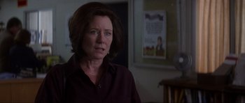 Movie still from “Donnie Darko” (2001), directed by Richard Kelly – A person wearing a black shirt; Close Up shot, Over the shoulder angle