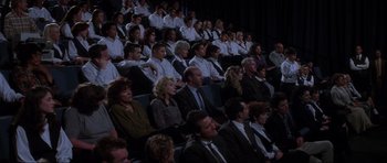 Movie still from “Donnie Darko” (2001), directed by Richard Kelly – A group of people sitting in a room; Wide shot, High angle