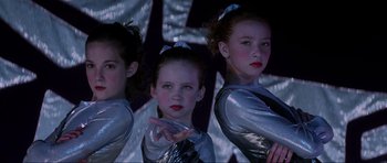 Movie still from “Donnie Darko” (2001), directed by Richard Kelly – A group of young girls standing next to each other; Close Up shot, Low angle