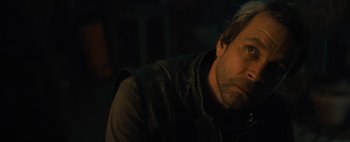 Movie still from “Don't Breathe 2” (2021), directed by Rodo Sayagues – A person wearing a jacket; Close Up shot, High angle