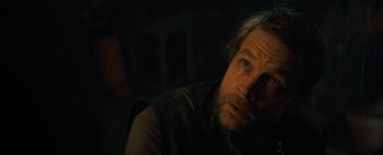 Movie still from “Don't Breathe 2” (2021), directed by Rodo Sayagues – A person looking at the camera; Close Up shot, Low angle