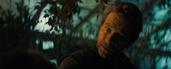 Movie still from “Don't Breathe 2” (2021), directed by Rodo Sayagues – A person looking at the camera; Close Up shot, Over the shoulder angle