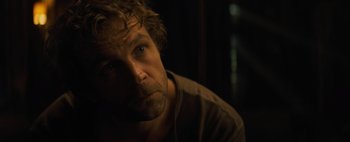 Movie still from “Don't Breathe 2” (2021), directed by Rodo Sayagues – A person looking at the camera; Close Up shot, Over the shoulder angle