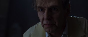 Movie still from “Doom” (2005), directed by Andrzej Bartkowiak – An older man is looking at the camera; Close Up shot, Low angle