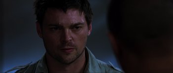 Movie still from “Doom” (2005), directed by Andrzej Bartkowiak – A person looking at the camera; Close Up shot, Over the shoulder angle