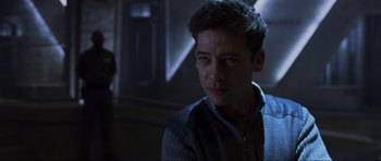 Movie still from “Doom” (2005), directed by Andrzej Bartkowiak – A person wearing a jacket; Close Up shot, Over the shoulder angle