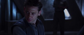 Movie still from “Doom” (2005), directed by Andrzej Bartkowiak – A person wearing a jacket; Close Up shot, Over the shoulder angle