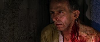 Movie still from “Doom” (2005), directed by Andrzej Bartkowiak – A person wearing a jacket; Close Up shot, High angle