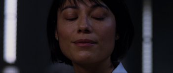 Movie still from “Doom” (2005), directed by Andrzej Bartkowiak – A person with her eyes closed; Close Up shot, Low angle