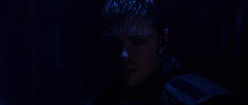 Movie still from “Doom” (2005), directed by Andrzej Bartkowiak – A person wearing a jacket; Close Up shot, Over the shoulder angle