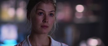 Movie still from “Doom” (2005), directed by Andrzej Bartkowiak – A person wearing a white shirt; Close Up shot, Over the shoulder angle