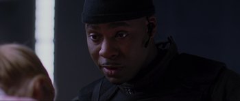 Movie still from “Doom” (2005), directed by Andrzej Bartkowiak – A person wearing a hat; Close Up shot, Low angle