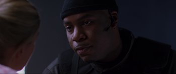 Movie still from “Doom” (2005), directed by Andrzej Bartkowiak – A person wearing a hat; Close Up shot, Low angle