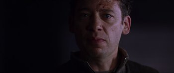 Movie still from “Doom” (2005), directed by Andrzej Bartkowiak – A person with blood all over his face; Close Up shot, Low angle