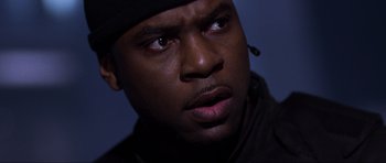 Movie still from “Doom” (2005), directed by Andrzej Bartkowiak – A person wearing a hat; Close Up shot, Low angle