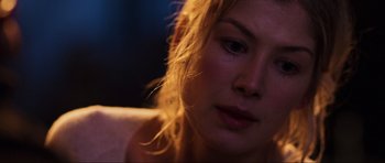 Movie still from “Doom” (2005), directed by Andrzej Bartkowiak – A woman's face in the dark; Close Up shot, Over the shoulder angle