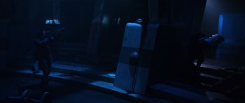 Movie still from “Doom” (2005), directed by Andrzej Bartkowiak – A piece of metal sitting on top of a floor; Extreme Wide shot, High angle