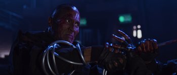 Movie still from “Doom” (2005), directed by Andrzej Bartkowiak – A person holding a wire; Close Up shot, Low angle