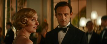 Movie still from “Downton Abbey: A New Era” (2022), directed by Simon Curtis – A man and a woman standing next to each other; Close Up shot, Over the shoulder angle