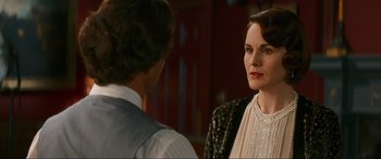 Movie still from “Downton Abbey: A New Era” (2022), directed by Simon Curtis – A man and a woman talking to each other; Close Up shot, Over the shoulder angle