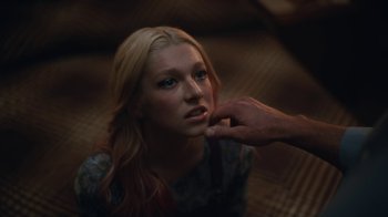 Movie still from “Euphoria” (2019), created by Sam Levinson – A person touching the face of a woman; Close Up shot, Overhead angle