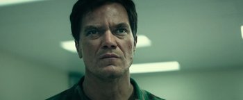 Movie still from “12 Strong” (2018), directed by Nicolai Fuglsig – A person wearing a green shirt; Close Up shot, Low angle