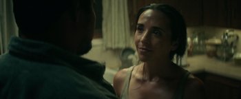 Movie still from “12 Strong” (2018), directed by Nicolai Fuglsig – A man and a woman are looking at one another; Close Up shot, Over the shoulder angle