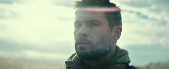 Movie still from “12 Strong” (2018), directed by Nicolai Fuglsig – A person with a beard; Close Up shot, Low angle