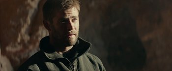 Movie still from “12 Strong” (2018), directed by Nicolai Fuglsig – A person wearing a jacket; Close Up shot, Over the shoulder angle