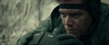 Movie still from “12 Strong” (2018), directed by Nicolai Fuglsig – A person wearing a jacket; Close Up shot, Over the shoulder angle