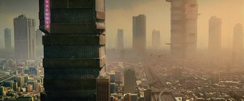 Movie still from “Dredd” (2012), directed by Pete Travis – A view of a large city from a tall building; Extreme Wide shot, High angle