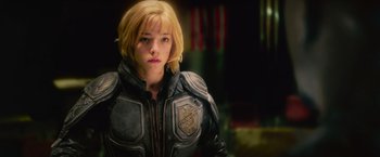 Movie still from “Dredd” (2012), directed by Pete Travis – A person wearing a jacket; Close Up shot, Low angle