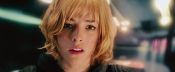 Movie still from “Dredd” (2012), directed by Pete Travis – A person with blonde hair; Close Up shot, Low angle