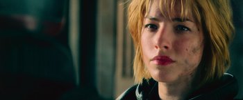 Movie still from “Dredd” (2012), directed by Pete Travis – A person wearing a leather jacket; Close Up shot, Low angle