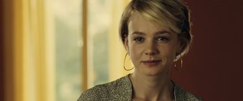 Movie still from “Drive” (2011), directed by Nicolas Winding Refn – A person wearing a jacket; Close Up shot, Over the shoulder angle