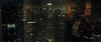 Movie still from “Drive” (2011), directed by Nicolas Winding Refn – A view of a city at night from a skyscraper; Extreme Wide shot, High angle