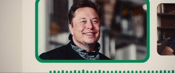 Movie still from “Dumb Money” (2023), directed by Craig Gillespie – A man smiling for the camera in a black jacket; Close Up shot, Low angle