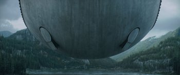Movie still from “Dune” (2021), directed by Denis Villeneuve – A view of a body of water from underneath a boat; Extreme Wide shot, Low angle