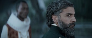 Movie still from “Dune” (2021), directed by Denis Villeneuve – A person with a beard; Close Up shot, Over the shoulder angle