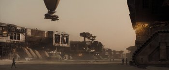 Movie still from “Dune” (2021), directed by Denis Villeneuve – An abandoned building in the middle of the desert; Extreme Wide shot, Low angle