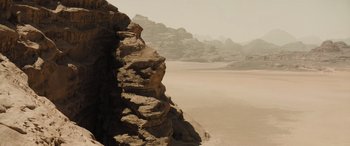 Movie still from “Dune” (2021), directed by Denis Villeneuve – A rock formation in the middle of the desert; Extreme Wide shot, High angle