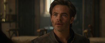 Movie still from “Dungeons & Dragons: Honor Among Thieves” (2023), directed by John Francis Daley – A person wearing a jacket; Close Up shot, Over the shoulder angle